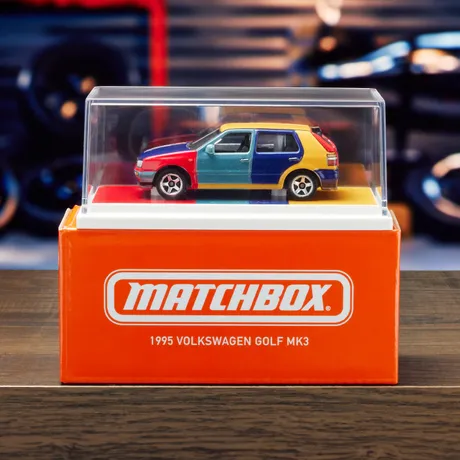 Matchbox Collectors 1995 Volkswagen Golf Harlequin in its display case and box